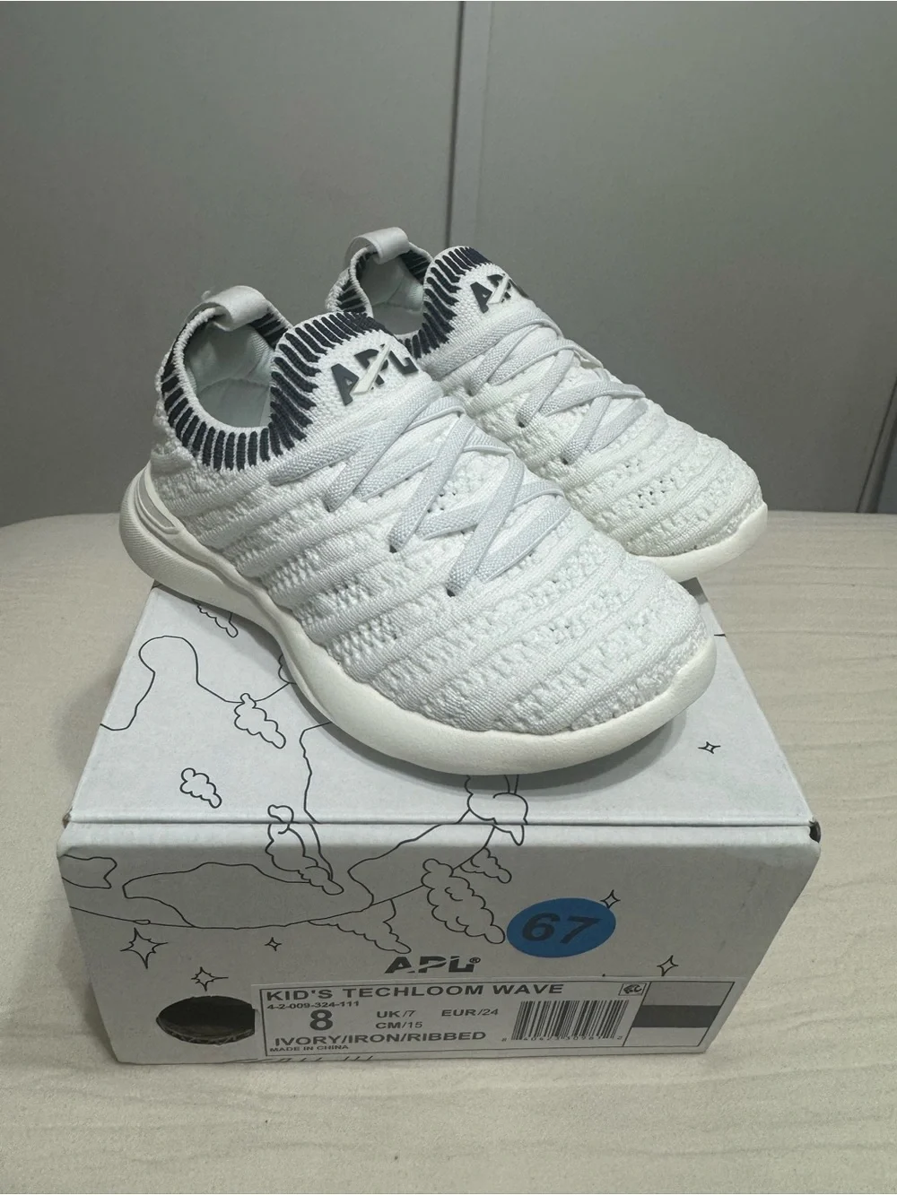 APL Kids' Techloom Wave Knit Sneaker in Ivory with Iron Ribbed Detail